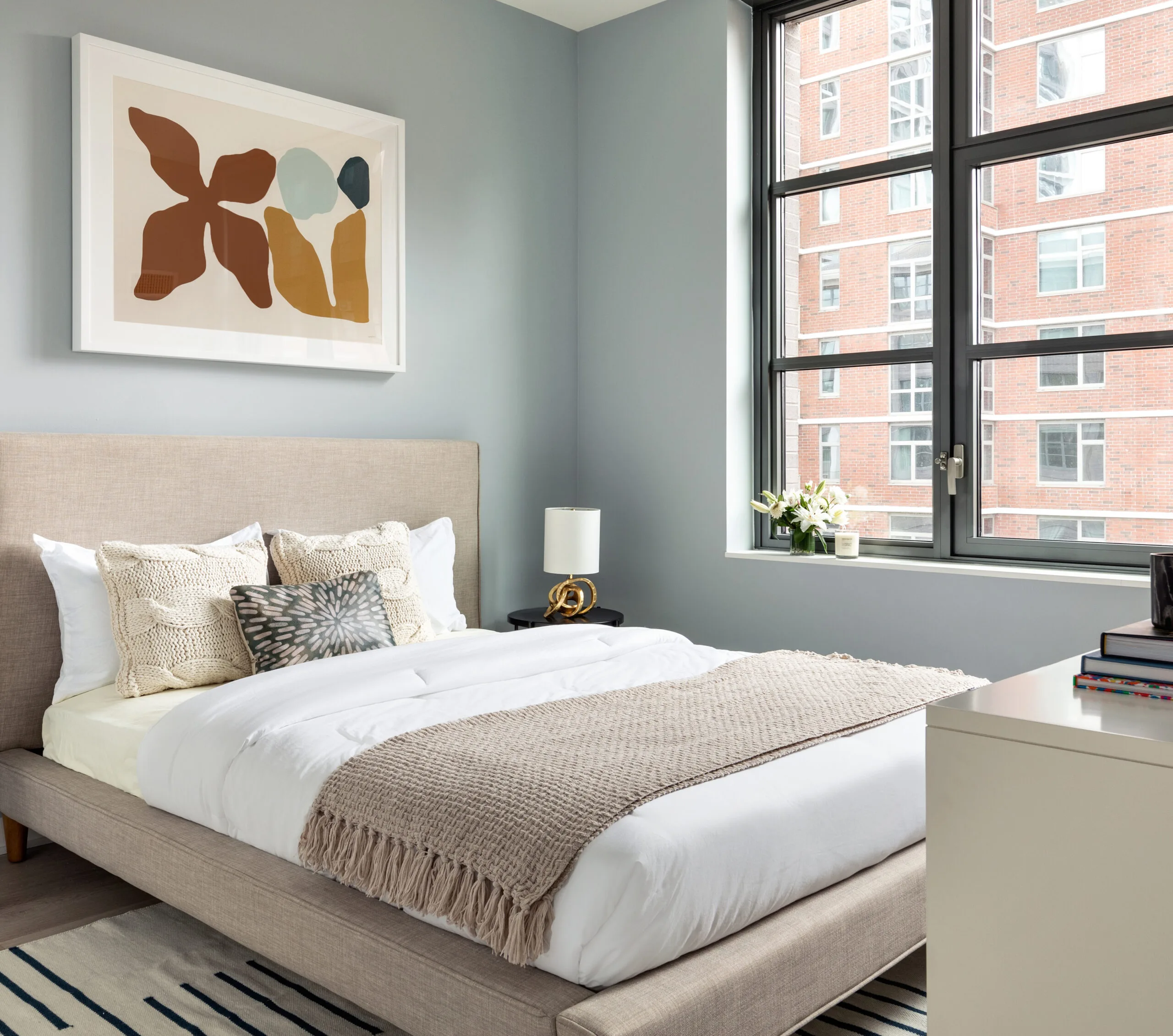 Elegant interior design featuring modern art, stylish décor, and a warm, inviting atmosphere